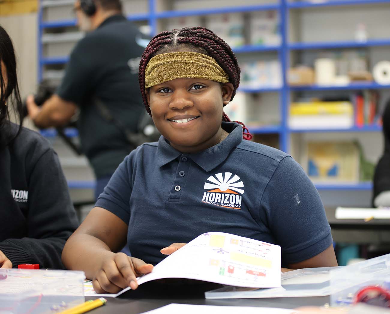 Smiling children together outdoors.